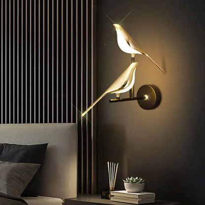 Luminous Lumens: The Modern Bird Sconce with Golden Glow