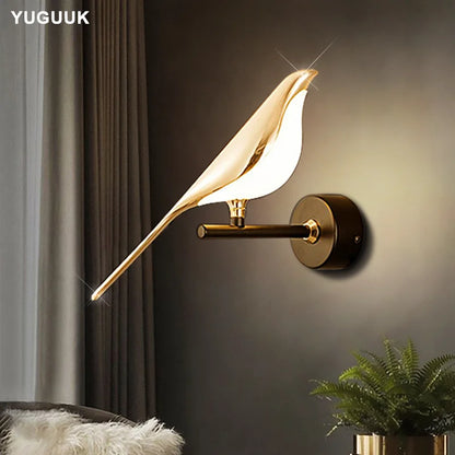 Luminous Lumens: The Modern Bird Sconce with Golden Glow