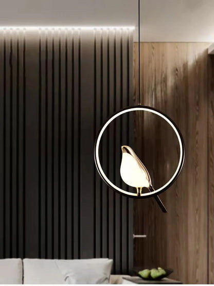 Luminous Lumens: The Modern Bird Sconce with Golden Glow