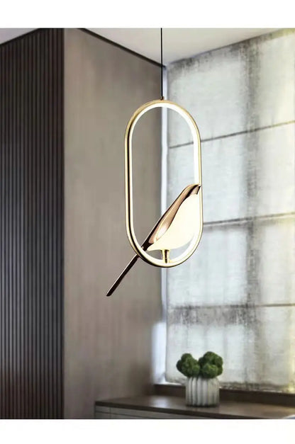 Luminous Lumens: The Modern Bird Sconce with Golden Glow