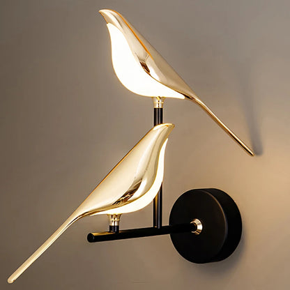 Luminous Lumens: The Modern Bird Sconce with Golden Glow